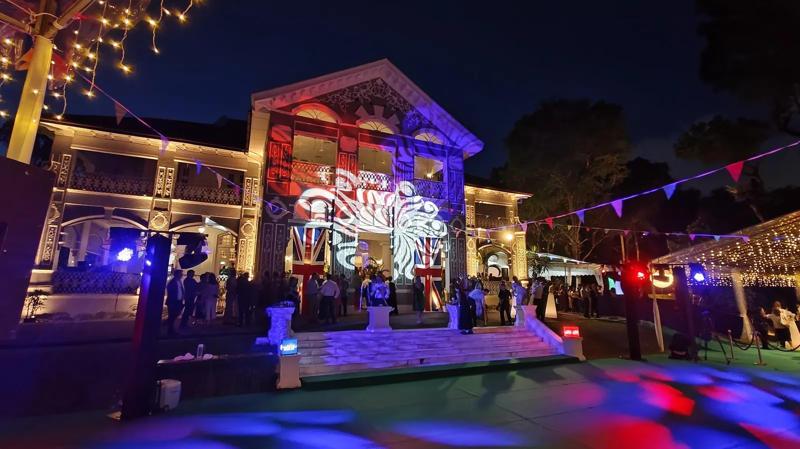 Historic building lit for an evening celebration